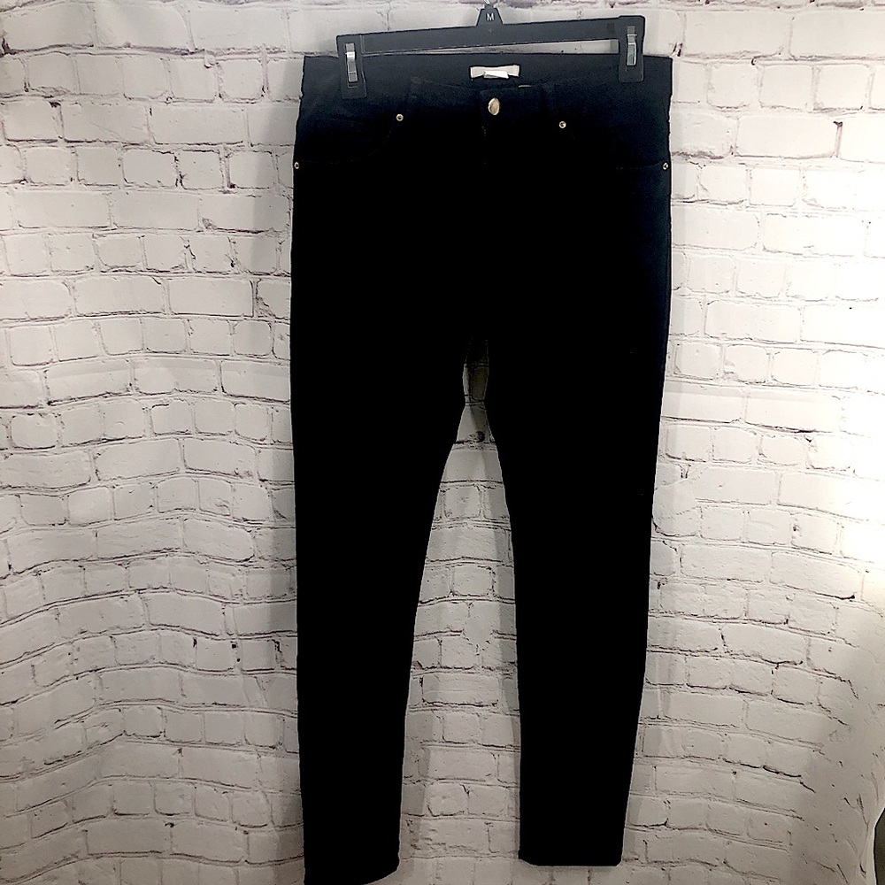 Woman’s sz 8 black stretch jeans
